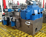 鼎斯液压供应热压机专用插装阀集成系统;